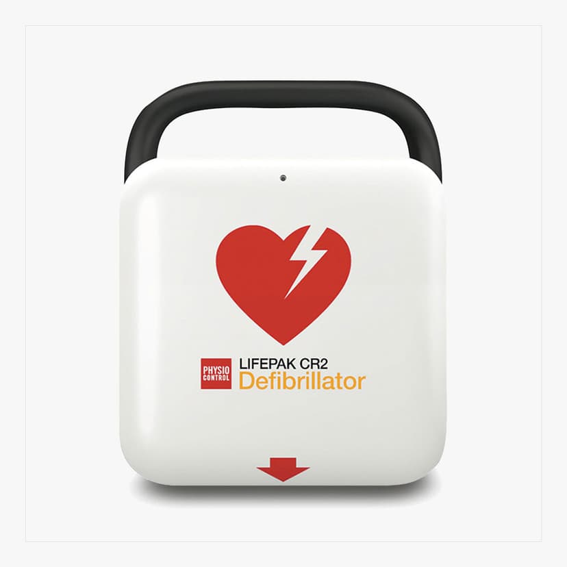 Hjärtstartare av modellen Lifepak CR2 uppställd på ett bord