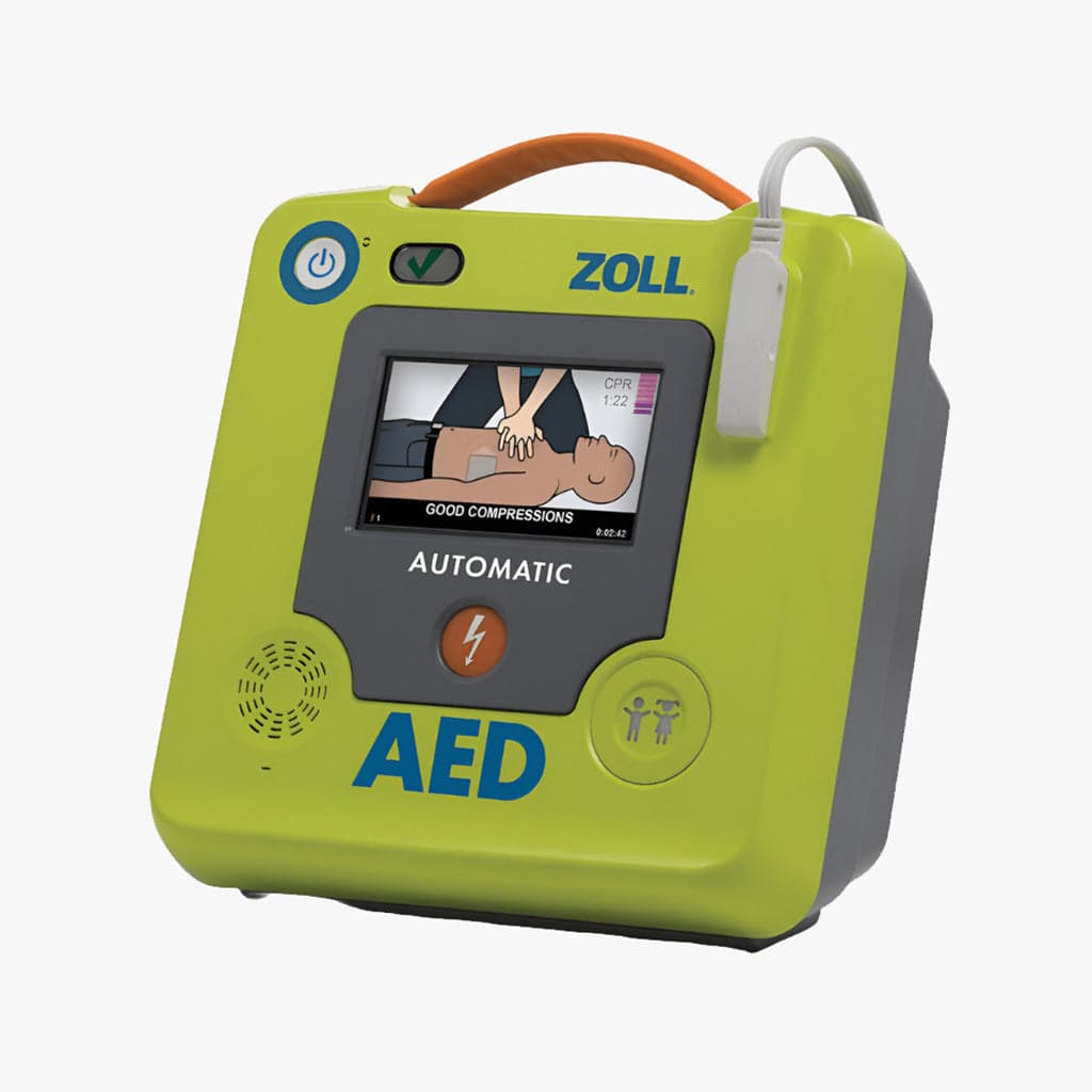 Hjärtstartare ZOLL AED 3 med öppet lock och elektroder framme